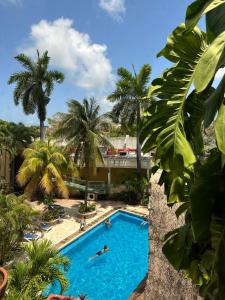 Bazén v ubytování Hotel Plaza Caribe nebo v jeho okolí