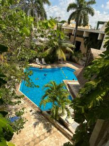 Bazén v ubytování Hotel Plaza Caribe nebo v jeho okolí