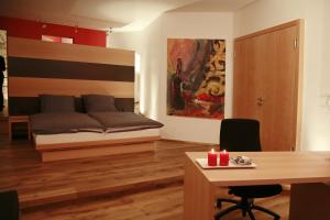 Postel nebo postele na pokoji v ubytování Hotel Der Achtermann