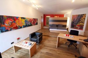 Posezení v ubytování Hotel Der Achtermann