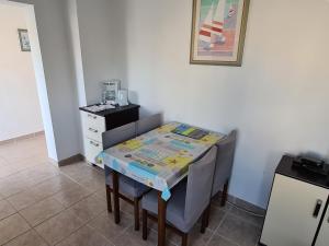 Kuchyň nebo kuchyňský kout v ubytování Family friendly apartments with a swimming pool Barbat, Rab - 4951