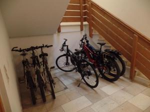 a group of bikes parked next to a staircase at Am Waldrand in Bayerisch Eisenstein