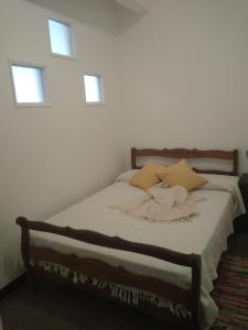 A bed or beds in a room at departamento Flor