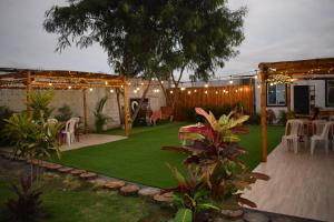 En hage utenfor Mare S&M Casa Hostal