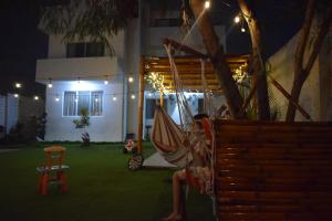 En hage utenfor Mare S&M Casa Hostal
