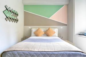 A bed or beds in a room at Scipioni Best Rooms
