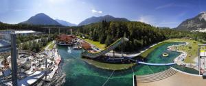 a view of a water park with a roller coaster at Landhaus Waldesruh in Oetz