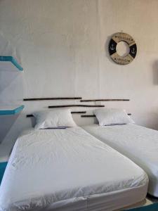 Cama o camas de una habitación en fantástica habitación frente al mar 103