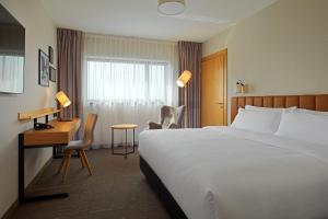 Postel nebo postele na pokoji v ubytování Four Points by Sheraton Warsaw Mokotow + 28 fotografií