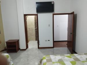 Postel nebo postele na pokoji v ubytování Casa D'Lucas