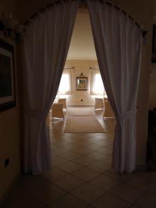 Säng eller sängar i ett rum på Hotel Ristorante Funtana Abbas