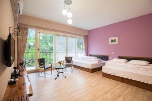 Postel nebo postele na pokoji v ubytování Three Maybe B&B