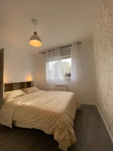 Posteľ alebo postele v izbe v ubytovaní Sleep In La Mulatière
