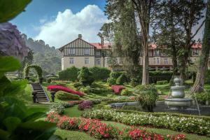 Κήπος έξω από το The Grand Hotel - Heritage Grand