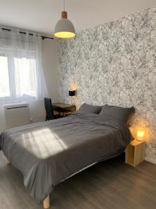 Posteľ alebo postele v izbe v ubytovaní Sleep In La Mulatière