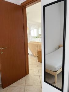 Postel nebo postele na pokoji v ubytování Dina Apartment