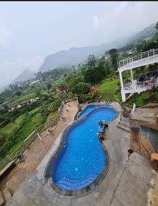 A view of the pool at Villa kaca 88 or nearby