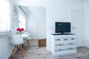 TV/Unterhaltungsangebot in der Unterkunft Köhlz Appartement im 1 OG
