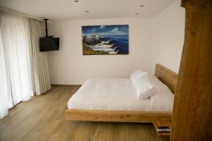 Letto o letti in una camera di Ruka Lobos