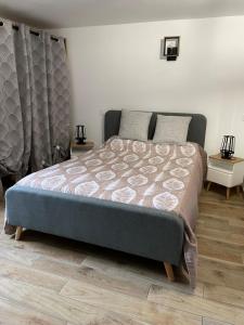 Ένα ή περισσότερα κρεβάτια σε δωμάτιο στο La Maison Clémenso