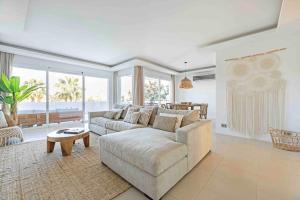 a living room with a couch and a table at Apartment in Marbella Golden Mile in Marbella