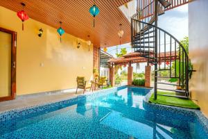Πισίνα στο ή κοντά στο An Bang Chic Villa Nguyên Căn