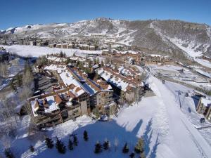 an aerial view of a resort in the snow at The Crestwood Snowmass Village in Snowmass Village
