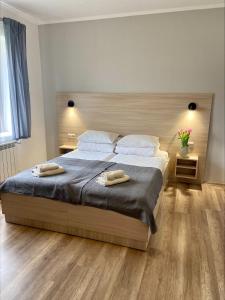 Ένα ή περισσότερα κρεβάτια σε δωμάτιο στο Villa Kmeller
