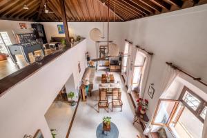 an overhead view of a living room and dining room at Nyara Fontainhas Panaji - Heritage villa Goa in Panaji
