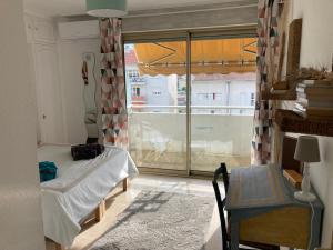 Posteľ alebo postele v izbe v ubytovaní Appart proche plage avec grand balcon