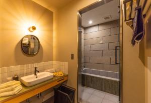 a bathroom with a sink and a shower at UU HOME - Vacation STAY 28487v in Biei