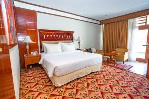 Postel nebo postele na pokoji v ubytování Hotel Savoy Homann