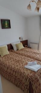 Postel nebo postele na pokoji v ubytování Gondola lift apartment + 21 fotografií