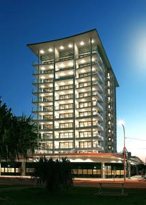 a large building with lights on top of it at Pure Kirra in Gold Coast