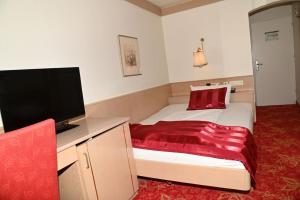 Postel nebo postele na pokoji v ubytování Hotel Hoeri am Bodensee