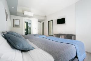 A bed or beds in a room at Scipioni Best Rooms