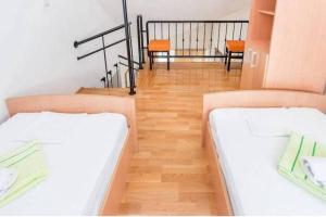 Postel nebo postele na pokoji v ubytování Majka Apartments + 27 fotografií