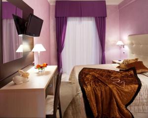 TV a/nebo společenská místnost v ubytování Hotel Petronio