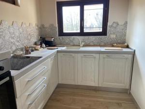 A kitchen or kitchenette at Villa Giulia - Homelike Villas