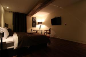 Cama ou camas em um quarto em Hotel Banwol