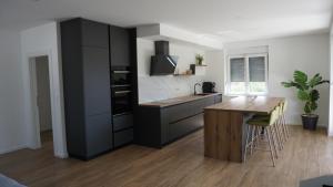 Kuchyň nebo kuchyňský kout v ubytování Apartments Jozef