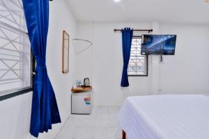 TV a/nebo společenská místnost v ubytování GP House Krabi Aonang Beach + 37 fotografií