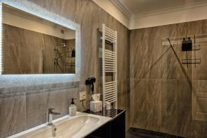 a bathroom with a sink and a mirror at Ancona e Riviera Luxury b&b in Ancona