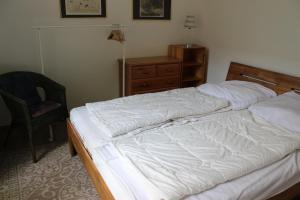 Postel nebo postele na pokoji v ubytování Ferienhaus "Am Deich 30"