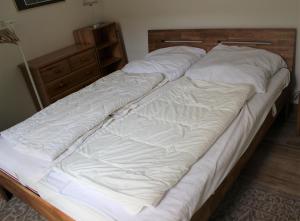 Postel nebo postele na pokoji v ubytování Ferienhaus "Am Deich 30"