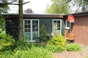 Zahrada ubytování Ferienhaus "Am Deich 30"