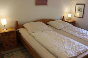 Postel nebo postele na pokoji v ubytování Ferienhaus "Am Deich 30"