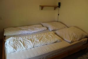 Postel nebo postele na pokoji v ubytování Ferienhaus "Am Deich 30"