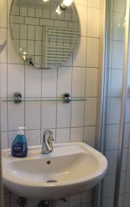 Koupelna v ubytování Ferienhaus "Am Deich 30"