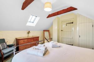 Postel nebo postele na pokoji v ubytování Cwm Bach